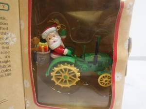 lot 19365 image: John Deere Christmas ornament with santa on a tractor