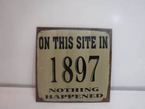 lot 19372 image: on this site in 1897 nothing happened humor tin sign