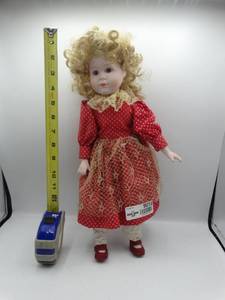 lot 9018 image: 15 1989 heritage mint porcelain doll with red dress (no stand )