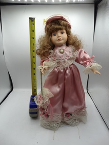 lot 9032 image: approximately 4 victorian style porcelain doll with matching pink satin dress and bonnet