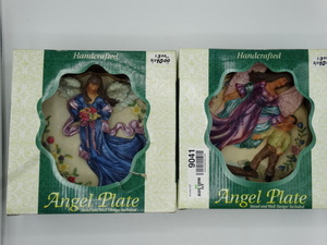lot 9041 image: ceramic plates with an angelic design