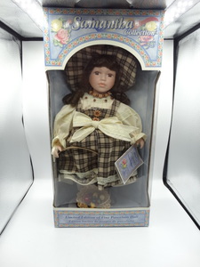 lot 9060 image: approximately 4 victorian style porcelain doll with matching pink satin dress and bonnet