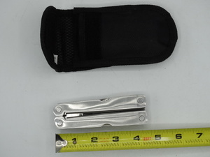 lot 9097 image: approximately 7 stainless multi purpose tool with case