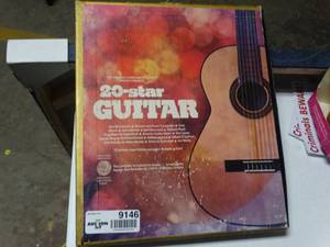lot 9146 image: collection of best guitar songs on 4 Atrack cassettes with COA