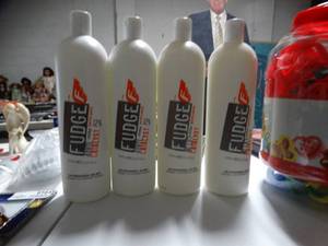 lot 9148 image: 4 bottles of 1000 mil hair product