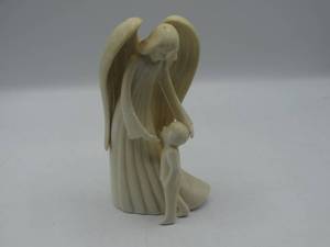 lot 9154 image: ceramic figurine of an angel protecting a child
