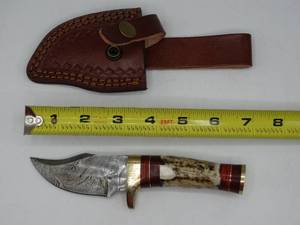 lot 9191 image: Curved 7 Damascus steel knife with holster