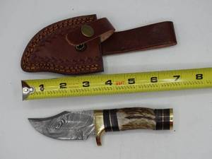 lot 9198 image: 7 Damascus steel knife with holster