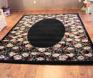 lot 3026 image: Black and Floral area rug 91 x 130