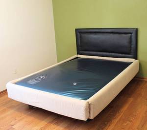 lot 3016 image: Queen Size Waterbed with Black Headboard and NaturalIvory Upholstered Side Boards - Could Convert to a Platform Bed with Q Mattress
