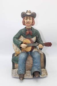 lot 3012 image: Vintage WACO Musical Melody In Motion Cowboy, The Guitarist