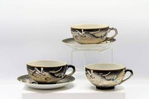 lot 3125 image: Vintage Nippon Meiyo China Dragonware Teacups and Saucers - Geisha Image on the Bottom of Each Cup - See pics