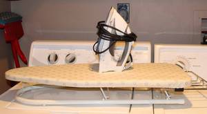 lot 3295 image: Black & Decker Iron and Tabletop Ironing Board