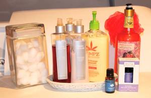lot 3298 image: Variety of Bathroom Decor, Essential Oils, Moisturizers, Glass Container...