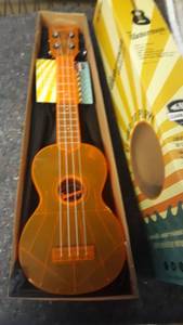 lot 5593 image: Kala Ka-swf-or Soprano Waterman Ukulele - Fluorescent Orangesicle