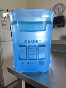 lot 1124 image: San Jamar Ice Bucket And Wet Floor Sign