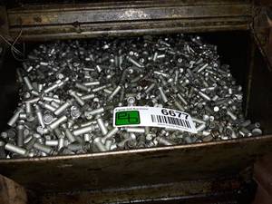 lot 6677 image: Metal Bin Full of Rivet Tops