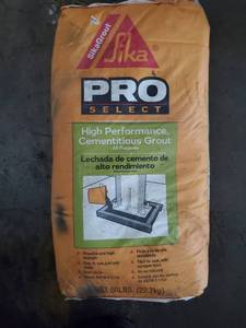 lot 10626 image: Bag of Pro Select Grout