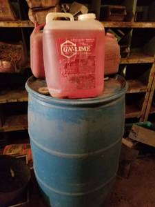 lot 2341 image: Water Heater Lime Scale Dissolver, 55 Gal Plastic Drum & Plastic Gas Can