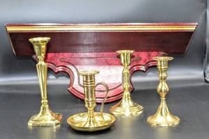lot 3462 image: 17 Gilded Dark Redwood Wall Shelf and 4 Brass Candle Stick Holders
