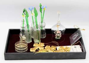 lot 3599 image: Velvet Lined Black Tray with Variety of Home Decor - Glass Flowers in glass vases, Cowpigduck Bell, Ornaments...