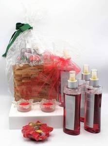 lot 3605 image: Baked Apple Pie Room Spray & Lotion Gift Basket, (4) Additional bottles of Room Spray and some Votive Candleholders