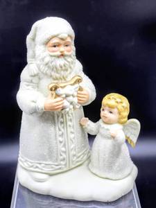 lot 3787 image: (4) Boxed Santa and Child Figurines from Home Interiors