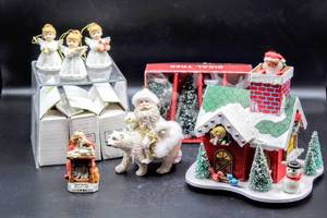 lot 3790 image: Christmas Variety Lot 4 Sisal Trees, Santa Riding Polar Bear, Vintage Enesco Musical House From Kansas Citys Ferrels Hallmark (Santas missing an arm, see pictures), 3 Sets of 3 Angel Ornaments by Homco, Vintage 1981 Norman Rockwell Ornament
