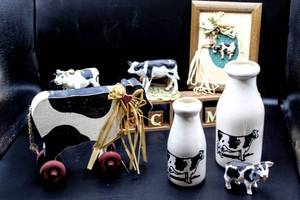 lot 3793 image: Country Wood Block Welcome sign, Rolling Cow on Wheels, Cow figurines, Cow 5x7 Wooden Picture and 2 Black and White Decorative Milk Bottles