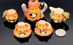lot 3804 image: Miniature Ceramic Pumpkin Face Halloween Tea Set