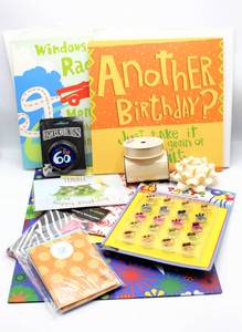 lot 3852 image: Happy Birthday to You Gift Bags, (2) Large Hallmark Musical Cards, wrapping paper, New ribbon and Bow and more...