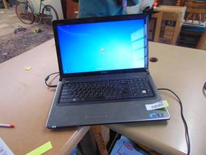 lot 2303 image: Dell Inspiron 1764 Laptop - Powers Up - Windows 7
