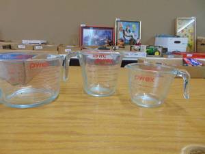 lot 2315 image: Three Pyrex Measuring Cups