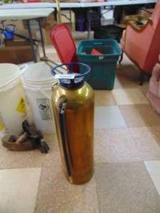 lot 2366 image: Brass Colored 2.5 gallon Fire Extinguisher