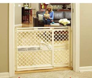 lot 39227 image: North States 42 Wide Supergate Ergo Baby Gate Easy-fit and Adjustable. Pressure or Hardware Mount (mounts Included). Fits 26-42 Wide (26 Tall, Sand)