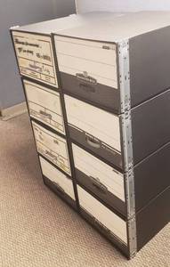 lot 6097 image: Lot of 8 Cardboard Legal Size Storage Boxes (17 in. x 25 in. x 11 in.) Stacked in Sets of 4
