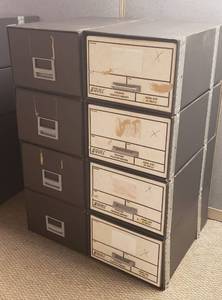 lot 6103 image: Lot of 8 Cardboard Legal Size Storage Boxes (17 in. x 25 in. x 11 in.) Stacked in Sets of 4