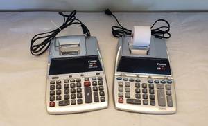 lot 6195 image: Lot of Canon MP11DX & MP18D Adding Machines  powers on