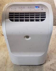 lot 6234 image: Portable GE Air Conditioner  Works  18in. x 18 in. x 33 in.