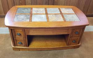 lot 6252 image: Ashley Furniture Plank Park Oval Lift Top  8 pieces of Slate Tile on Top  Model T463-9  49 in. x 28 in. x 19 12 in. (28 12 in. UP)