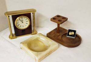 lot 6296 image: Walnut 4 Pipe Holder, Onyx Ashtray, Howard Miller Desk Clock (AA Battery Powered), and Barlow Keychain