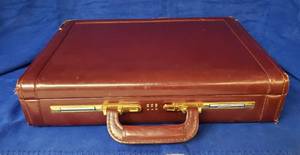lot 6303 image: Vintage Wine Leather Ventura Breifcase wcombo lock (113)  dings on corners & edges