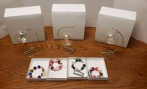 lot 6322 image: Collection of New Gifts from Von Maur  3 Christmas Ornaments and 4 Holiday Glass Bead Bracelets  NIB