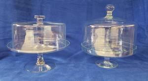 lot 6353 image: Pair of Clear Glass Pedestal Cake Plate Stands  One is 12 in. diameter x 10 in. tall and other is 11 in. diameter x 12 in. tall