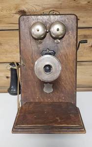 lot 1008 image: Antique American Electric Wall Telephone  missing bakelite mouthpiece  9 x 21 x 12 in.