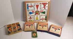 lot 1030 image: Vintage Games  3 Monopoly (no boards), Bulls Eye Tiddly Winks, Wa Hoo Board (no pieces) and Authors Card Game