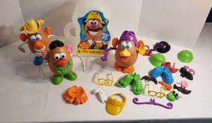 lot 1041 image: Mr. Potato Heads wVarious Attachments and Silly Suitcase