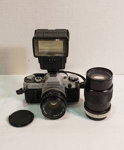lot 1066 image: Canon AE-1 35mm Camera w 12.8 Zoom Lens and Achiever TZ 250 Flash