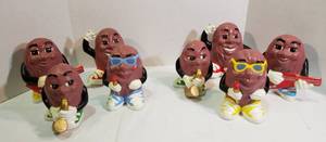 lot 1079 image: 2 Sets of Ceramic California Raisins  handmade 1988  6 to 7 in. tall