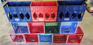 lot 1103 image: 9 Plastic Milk Crates and 3 Two-Liter PepsiCoke Crates  Various Brands